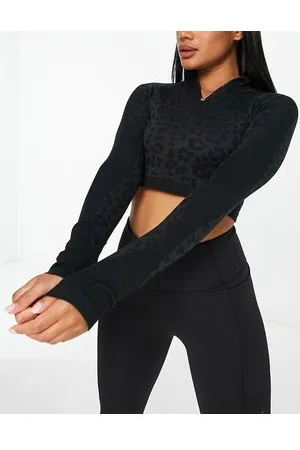 PUMA Training Evoknit seamless 1/4 zip top in black