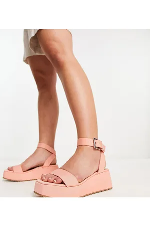 ASOS DESIGN Wide Fit Fiery cross strap flat sandals with diamante in pink