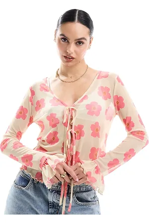 Pieces® Mesh tie front blouse with red floral print in cream
