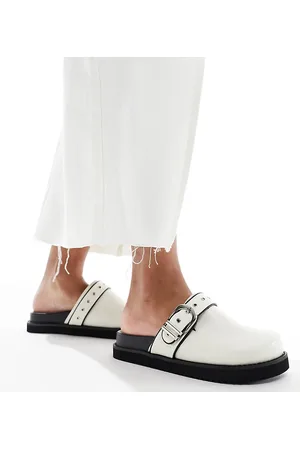 Raid Nellie platform mules in cream
