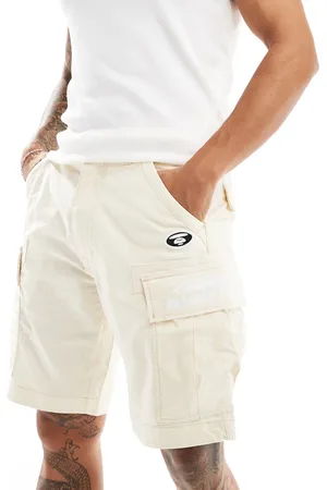 A Bathing Ape Aape By A Bathing Ape cargo utility shorts in sand