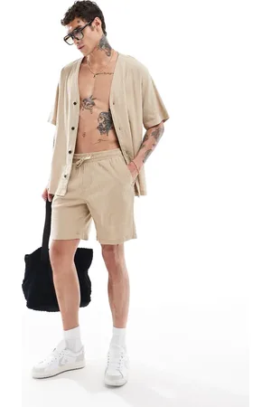 ADPT. Crinkle shorts in beige - part of a set