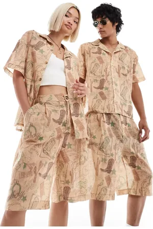 Reclaimed Unisex shorts with rodeo print