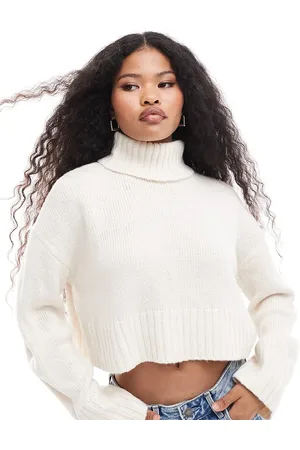 ASOS ASOS DESIGN Petite cropped roll neck sweater in cream