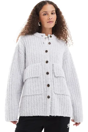Monki Chunky knit rib high neck cardigan with button front and front flap pockets in melange