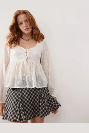 Reclaimed Tie front top with peplum hem and bow embroidery in chiffon