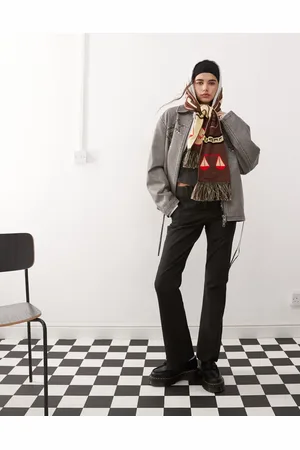 COLLUSION Low rise pinstripe kick flare pants in black