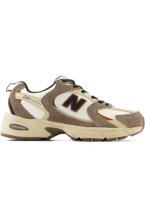 New Balance 530 sneakers in with brown details
