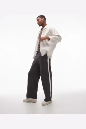 Topman Baggy leg sweatpants with contrast side stripe in charcoal