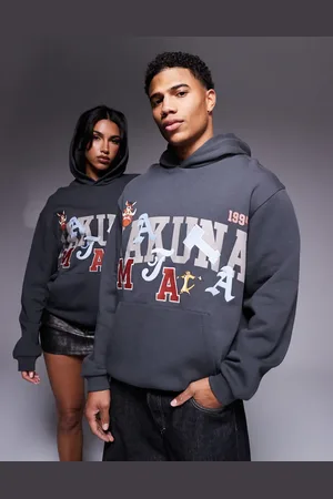 ASOS Disney unisex oversized hoodie with The Lion King Hakuna Matata prints in black