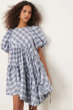 Ghospell Asymmetric drawstring mini dress in plaid