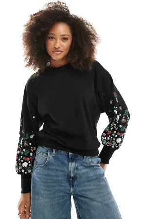 ONLY Crew neck sweater with floral sleeve detail in