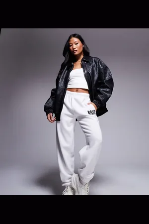 Kaiia Studio Petite cuffed wavy logo sweatpants in cream and black