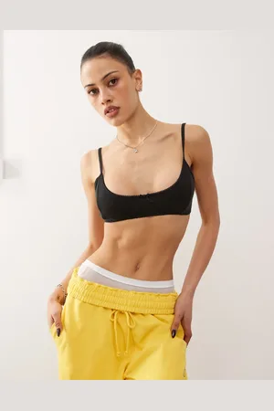 Monki Soft scoop neck pointelle bralet with small bow in washed