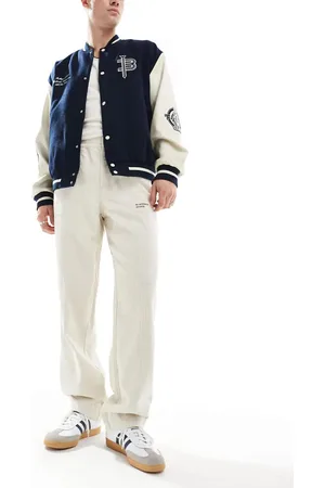 ASOS Baggy cord pants with embroidered patch in stone