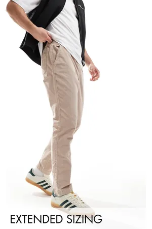 ASOS Tapered fit cord pants with elastic waist in taupe