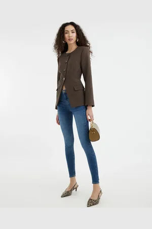 River Island Sculpting skinny jeans in midwash