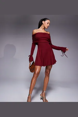 Murci Exclusive knitted bardot fold detail flippy hem mini dress in burgundy