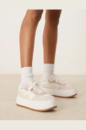 Calvin Klein Flatform sneakers in off- with gum sole