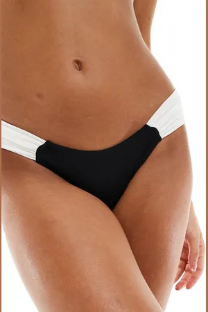 Free Society Ruched side contrast bikini bottoms in black and cream