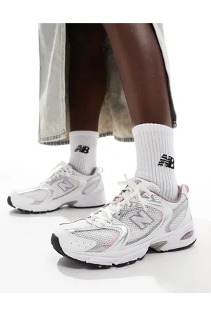 New Balance 530 sneakers in with pink details