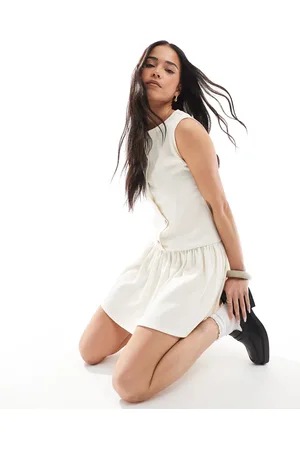 ASOS Texture sleeveless dropped waist mini dress with pearlized buttons in cream