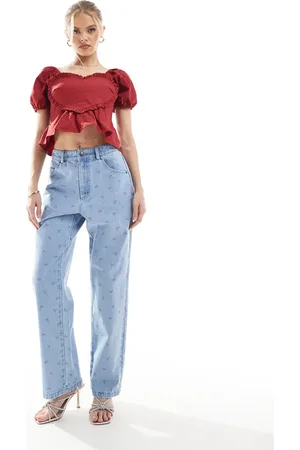 The Frolic Exclusive straight leg bow print jeans in light wash blue - part of a set