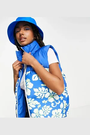 COLLUSION Sleeveless puffer vest with floral print