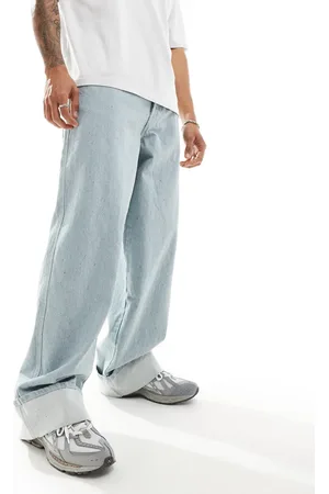 COLLUSION X002 baggy jeans in lightwash blue with cuffs
