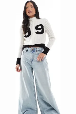 Stradivarius Petite wide flare jean in light wash