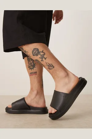 Calvin Klein Embossed slide sandals in