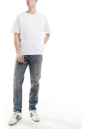 River Island Tapered fit jeans in midwash