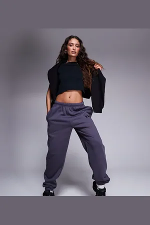 Kaiia Petite embroidered logo cuffed sweatpants in dark