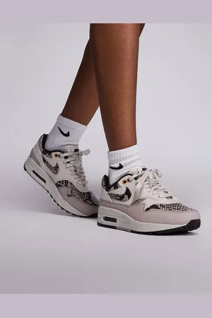 Nike Air Max 1 sneakers in and snake print