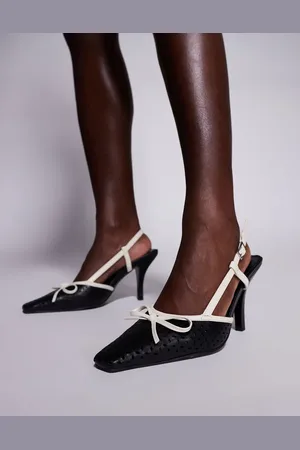 Public Desire Alchemy laser cute slingback heels with bow in cream and black