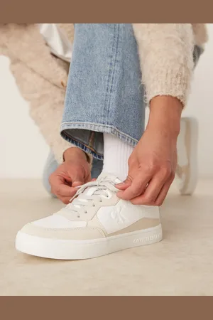Calvin Klein Classic cupsole sneakers in beige and white