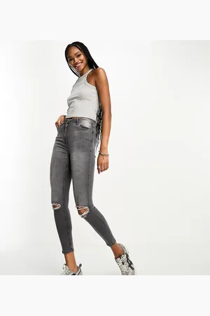 Parisian Skinny jeans with knee rips in