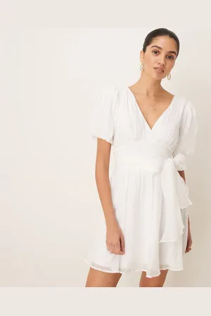 Gina Tricot Short sleeve v neck open back bow graduation mini dress in off