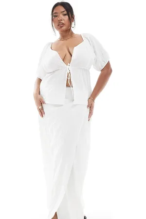 Esmée Esmée Curve Exclusive tie side wrap maxi beach skirt in