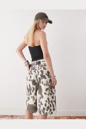 The Ragged Priest Low rise baggy jorts in cow print
