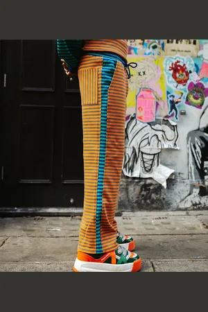 Labelrail X OliBrom straight leg sweatpants in orange and green contrast stripe - part of a set