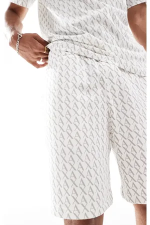 Armani Exchange Jersey shorts with all over logo print in - part of a set