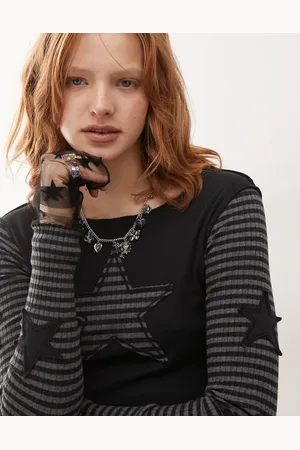 Minga London long sleeve striped star patch top in black and gray