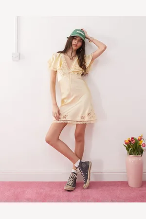 Reclaimed Mini tea dress with cape sleeves and lace cutwork in butter yellow