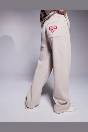 Kaiia Heart back pocket logo sweatpants in stone and red - part of a set