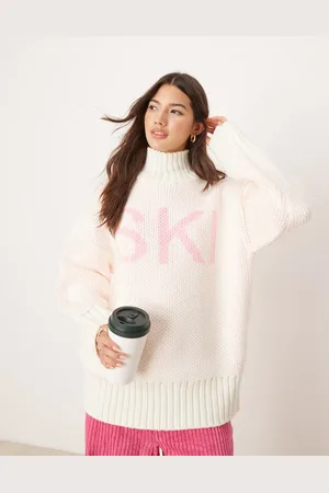 ASOS High neck chunky sweater with ski slogan in cream