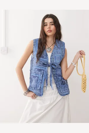 Reclaimed Printed tie front quilted reversible vest in powder print