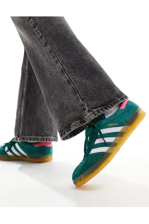 adidas Gazelle Indoor sneakers in dark with pink heel tab