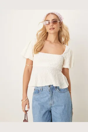 Gina Tricot Wavy textured jersey with puff sleeves and peplum hem in ecru