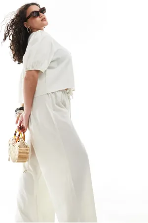 Esmée Exclusive drawstring beach pants in oat